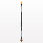 Makeup brush with black handle and orange and brown bristle head on a white background