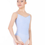 Ballerina wearing a light lavender leotard and pink tights on a white background