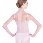 Ballerina in a pink leotard on a white background