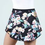 Floral patterned skirt on a plain background