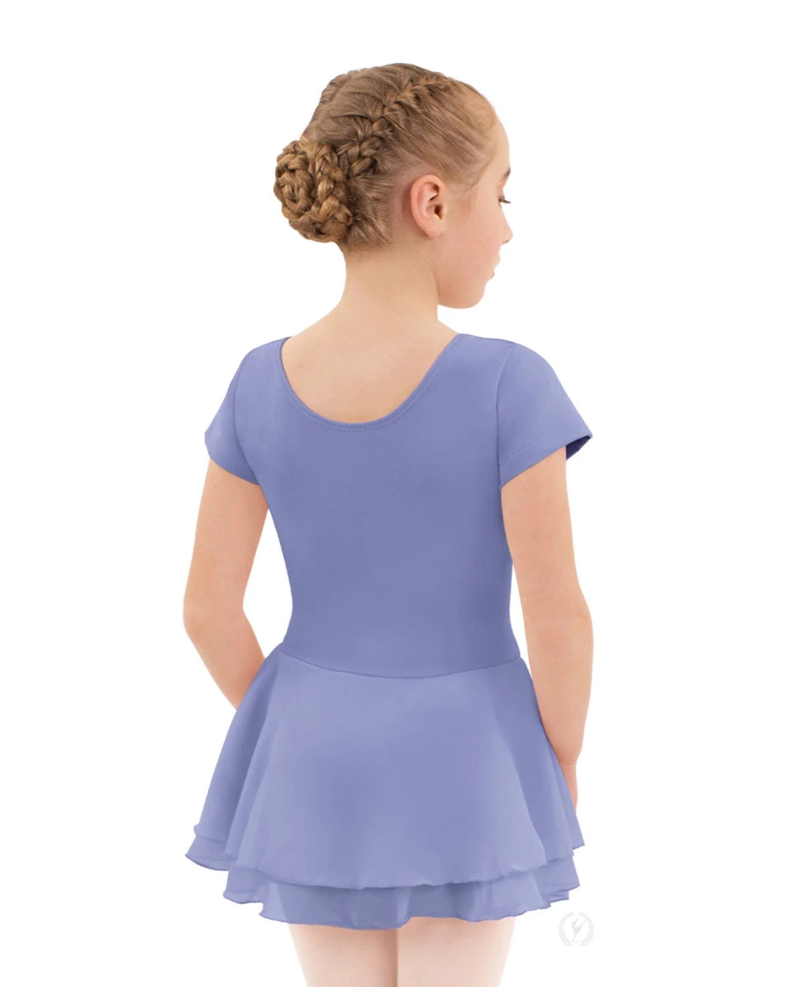 Young girl wearing a purple dress on a white background