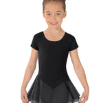 Young girl wearing a black ballet dress with a white background