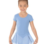 Young girl wearing a light blue dress with a white background