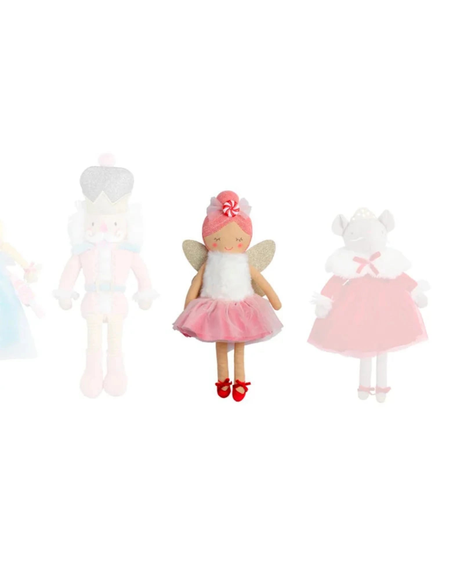 Set of four fairy dolls with different outfits on a white background