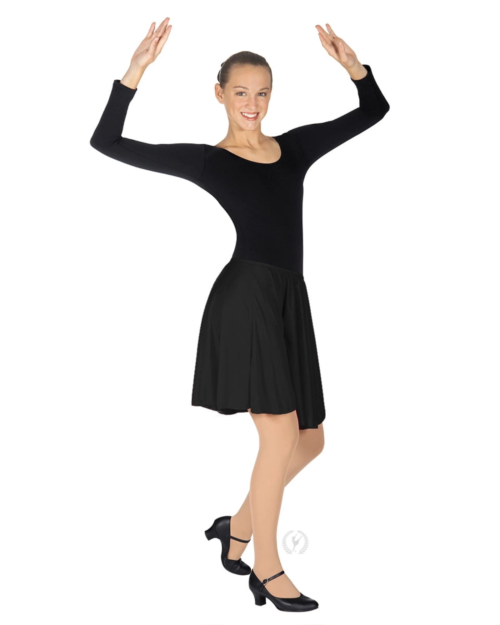Woman wearing a black skirt with a long sleeve black leotard on a white background
