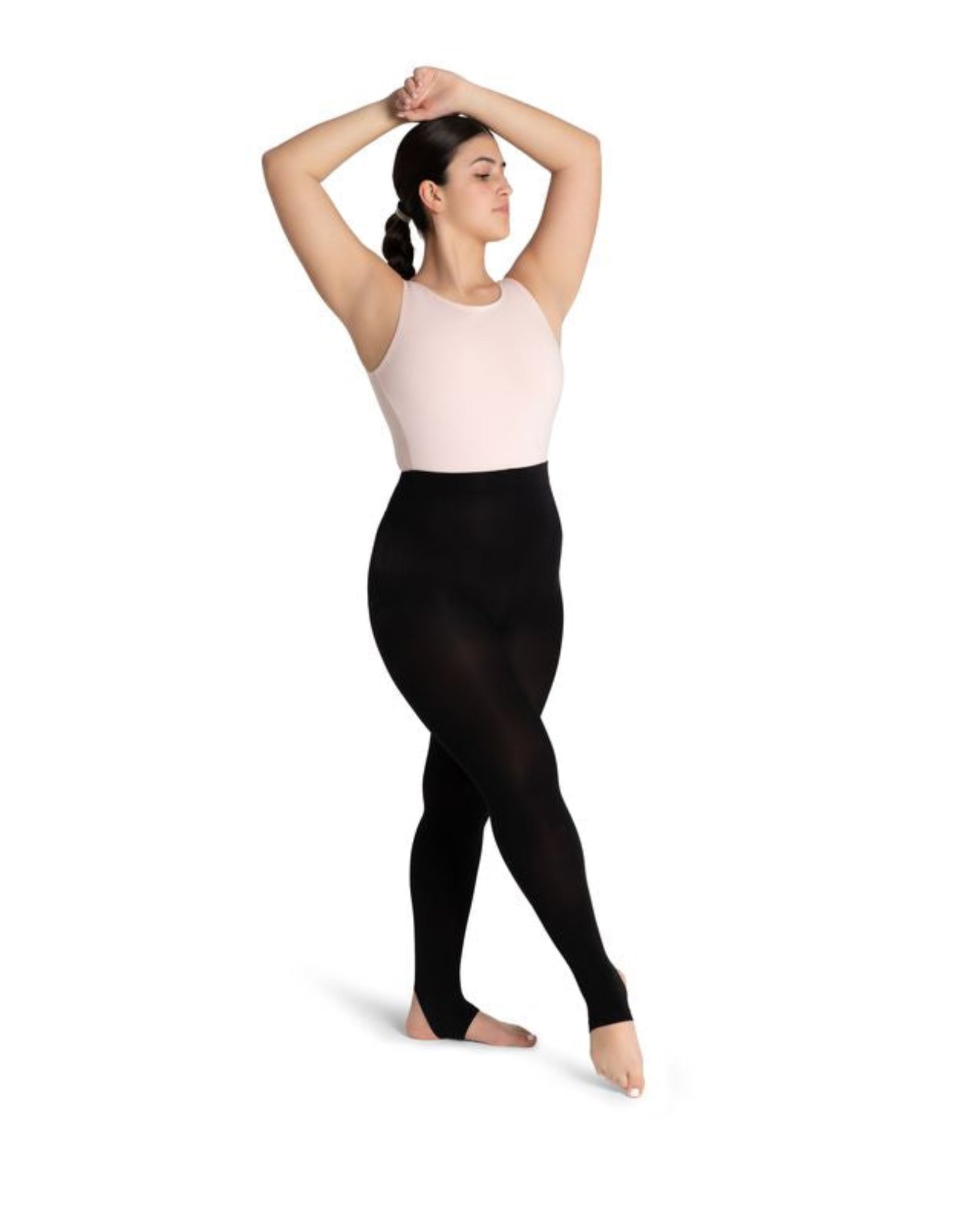 Person wearing a light pink tank top and black leggings on a white background