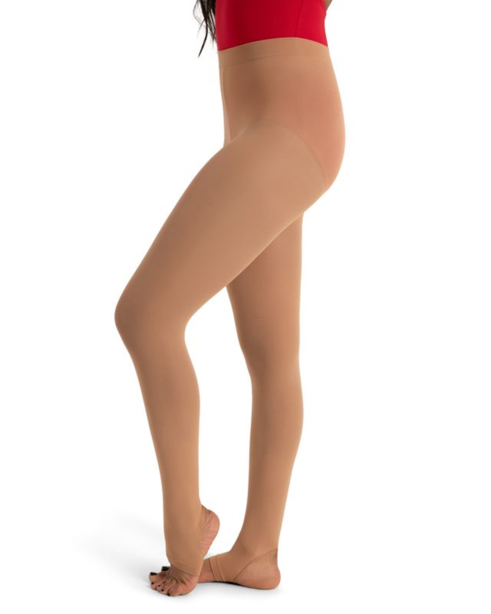 Beige tights worn by a person on a white background