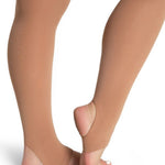 Beige tights worn by a person on a white background