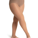Beige sheer tights worn by a person on a white background