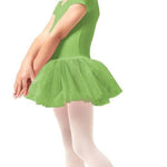 Young girl in a green ballet dress on a white background