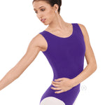 Woman wearing a purple leotard on a white background