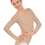 Woman wearing a nude bodysuit on a white background