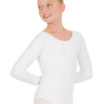 Young girl wearing a white long-sleeve leotard on a white background