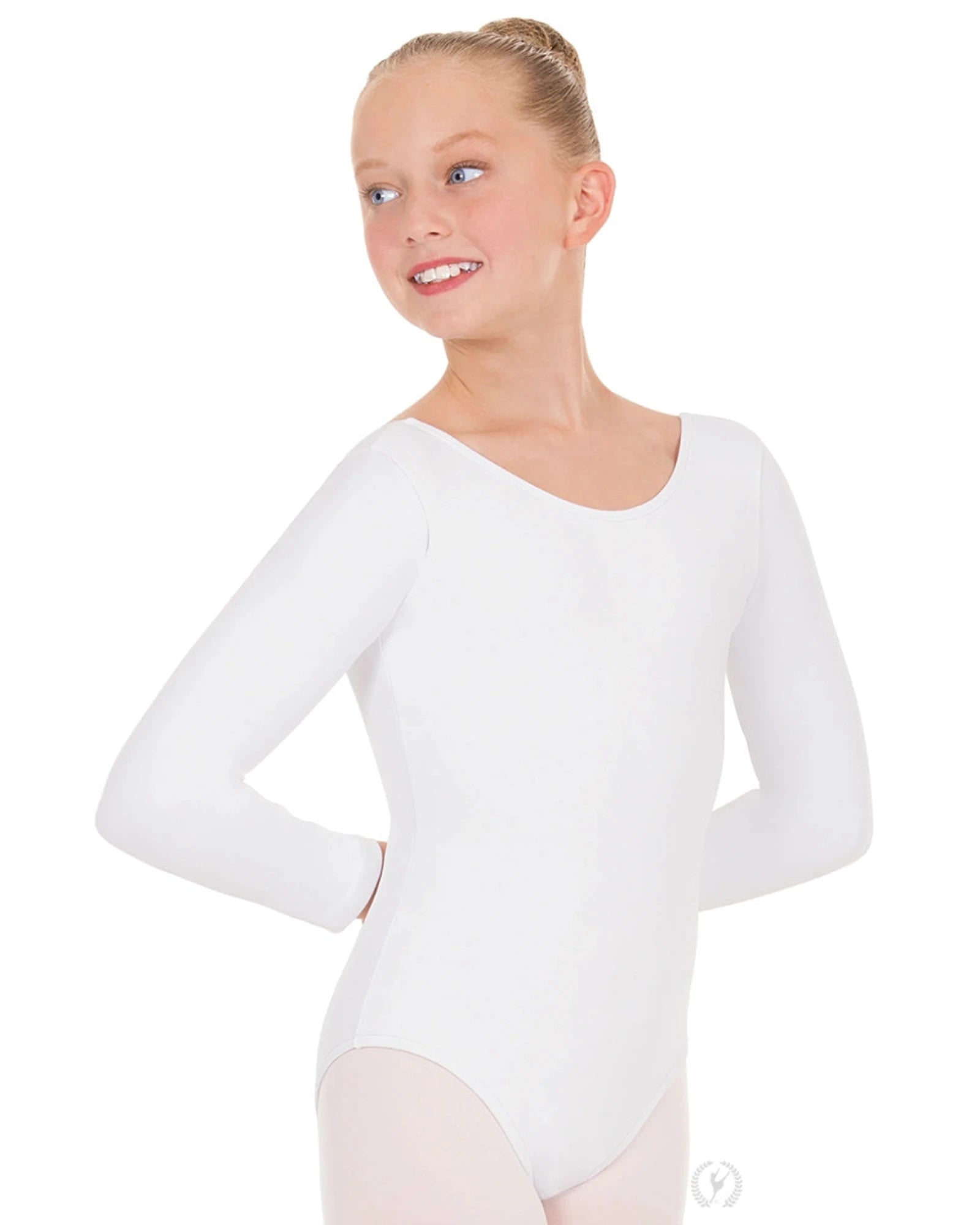 Young girl wearing a white long-sleeve leotard on a white background