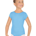 Young girl wearing a light blue cap sleeve leotard on a white background