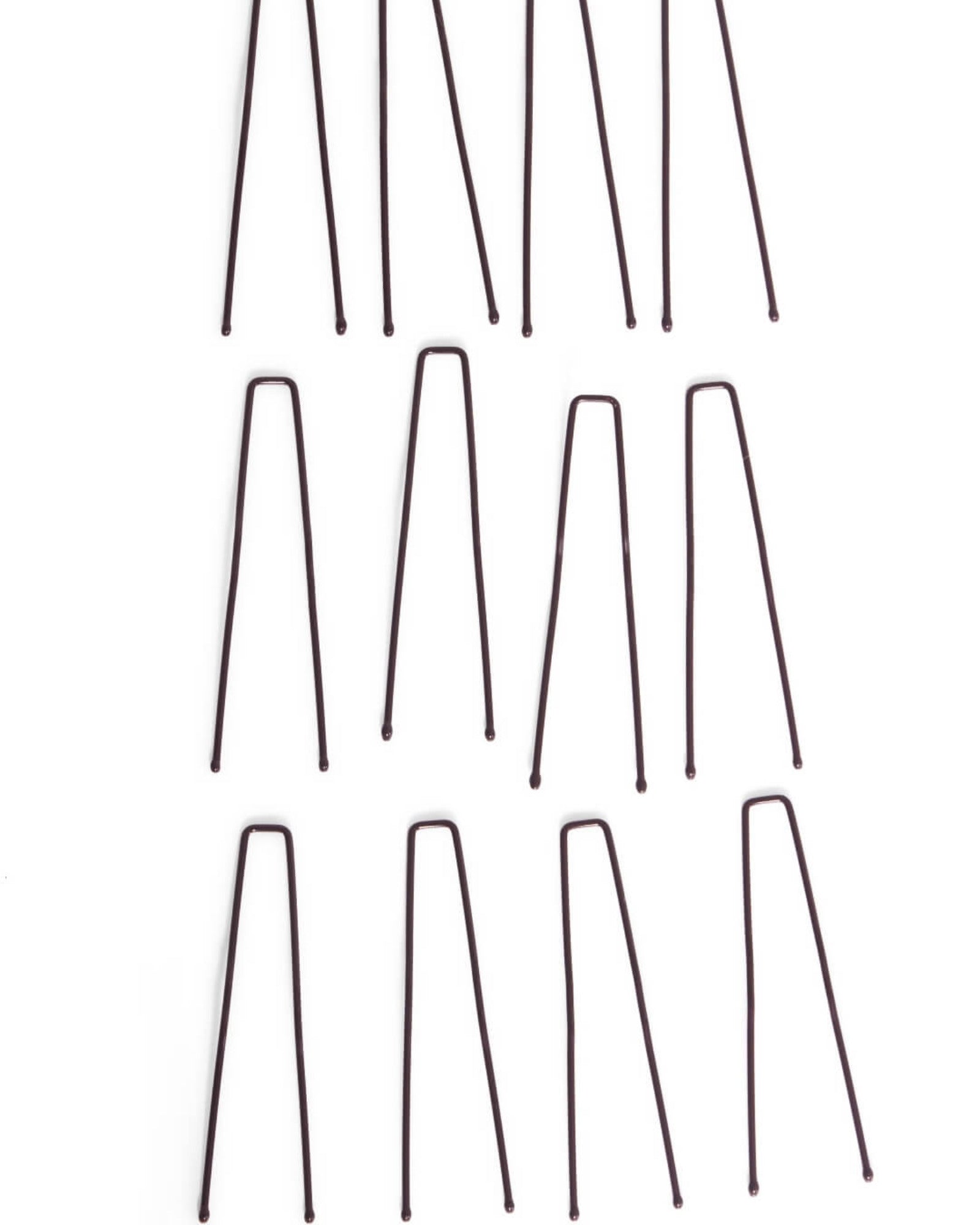 Set of black hairpins on a white background