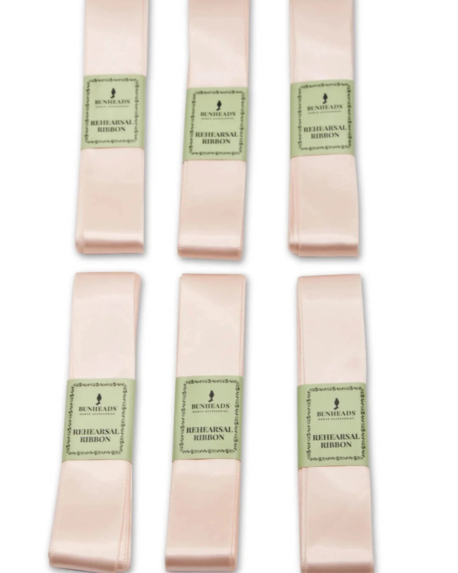 Six rolls of Bunheads 'Rehearsal Ribbon', arranged in two rows of three on a plain white background. Each roll is wrapped with a light green paper label showing the brand name.