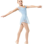A young girl dancer posing in a light blue patterned leotard with a matching tutu skirt and pointe shoes against a solid white background.