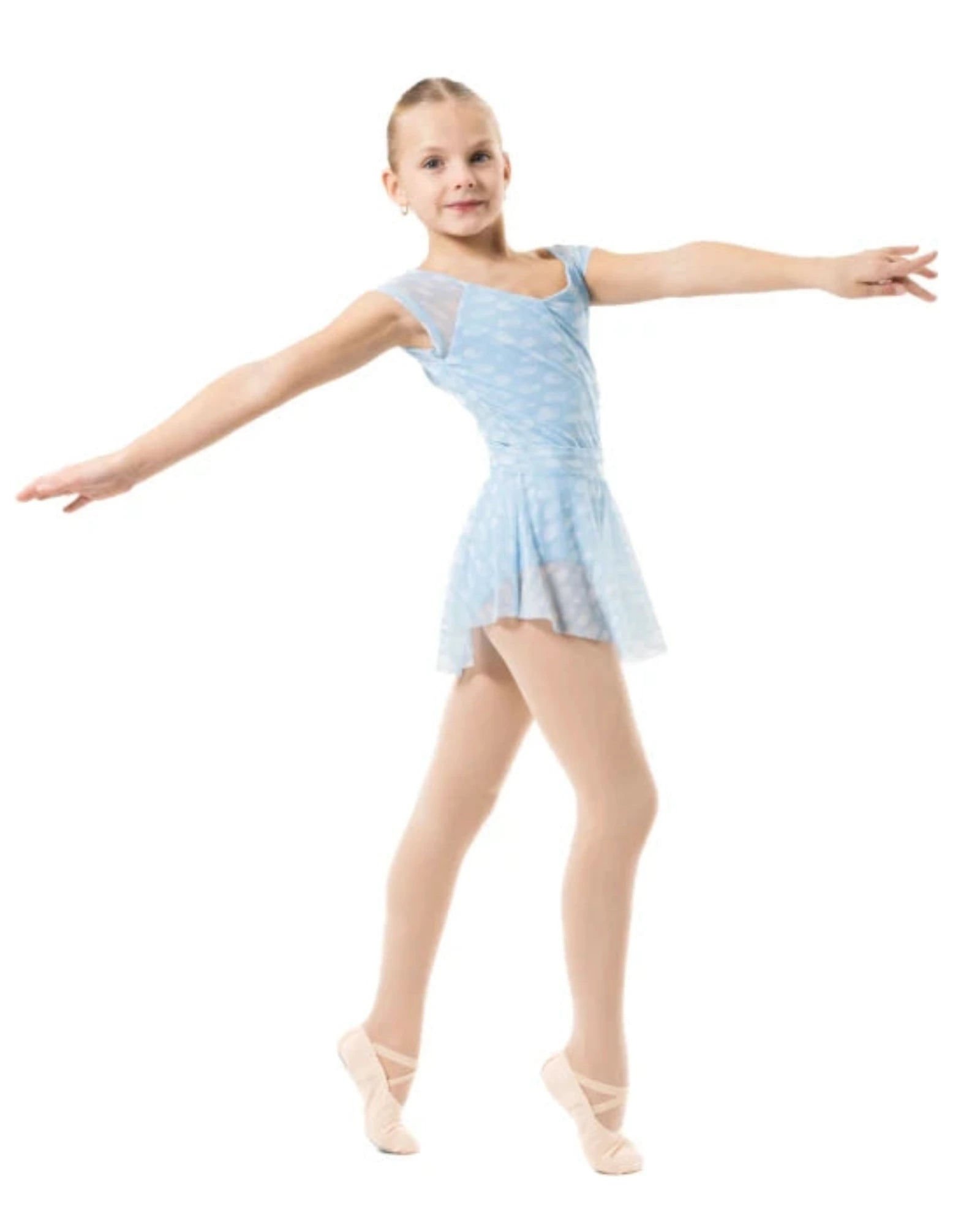 A young girl dancer posing in a light blue patterned leotard with a matching tutu skirt and pointe shoes against a solid white background.
