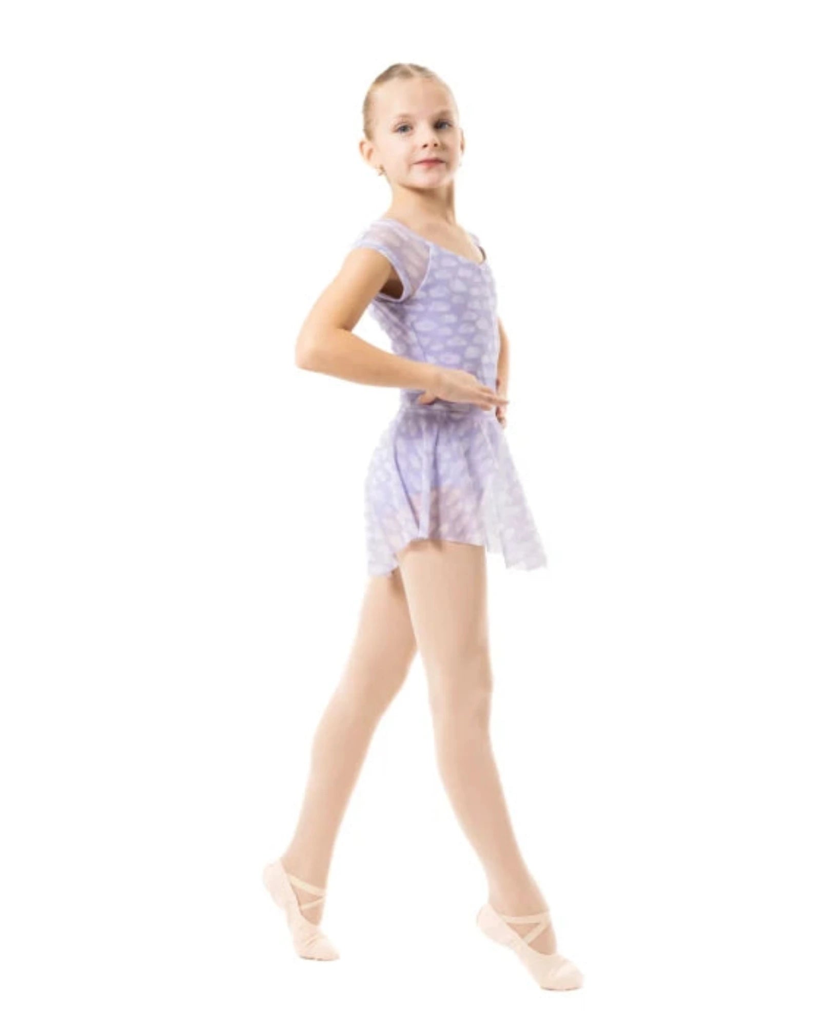 A young girl dancer posing in a sleeveless lavender and white patterned leotard with pink tights and ballet slippers against a solid white background.