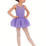 Young girl in a purple ballet dress on a white background