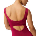 A woman shown from the back wearing a sleeveless berry leotard with a wide open back and a cutout detail at the waist, photographed against a plain white background.