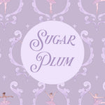 A square graphic with the words 'Sugar Plum' in purple script inside a pale lavender circle, set on a lavender background with a repeating ballet dancer and ornate frame pattern. The word 'Suffolk' appears in black script at the bottom right.