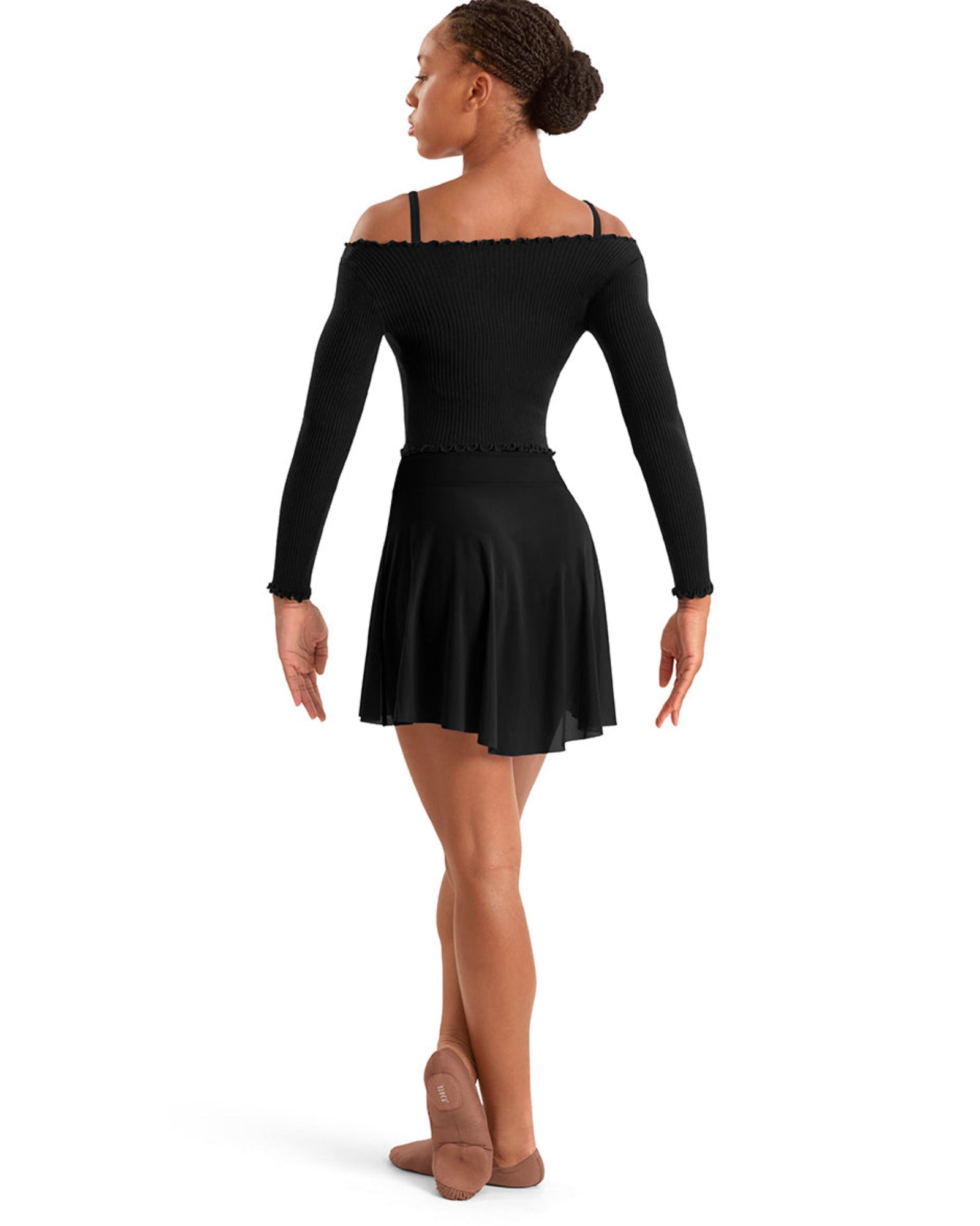 A woman modeling a black long-sleeve dance dress with an off-the-shoulder neckline and a flared skirt, shown from the back against a plain white background.