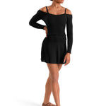 A woman modeling a black long-sleeve off-the-shoulder dance leotard top paired with a black skirt, shown from the side against a plain white background.