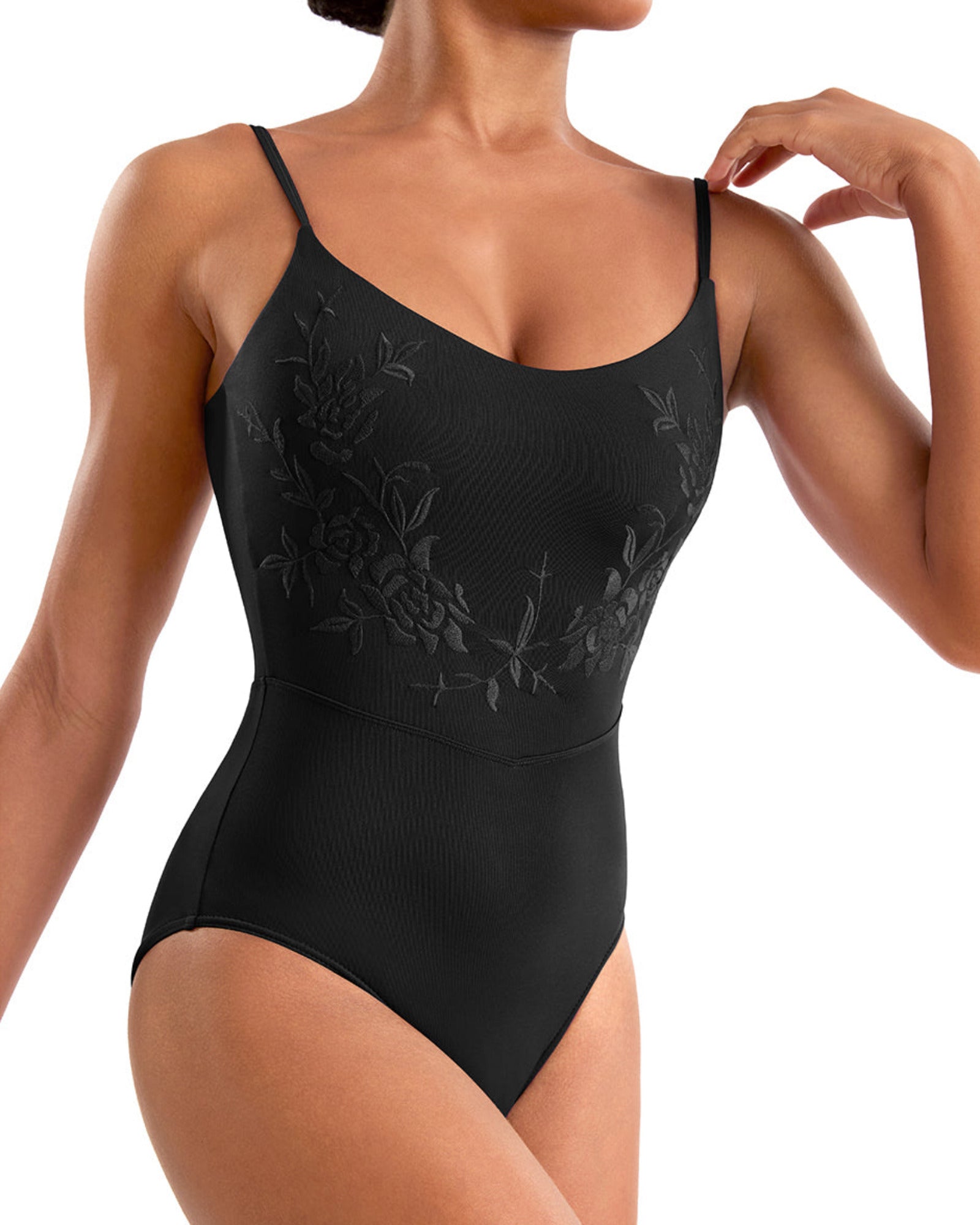 Black leotard worn by a model on a white background