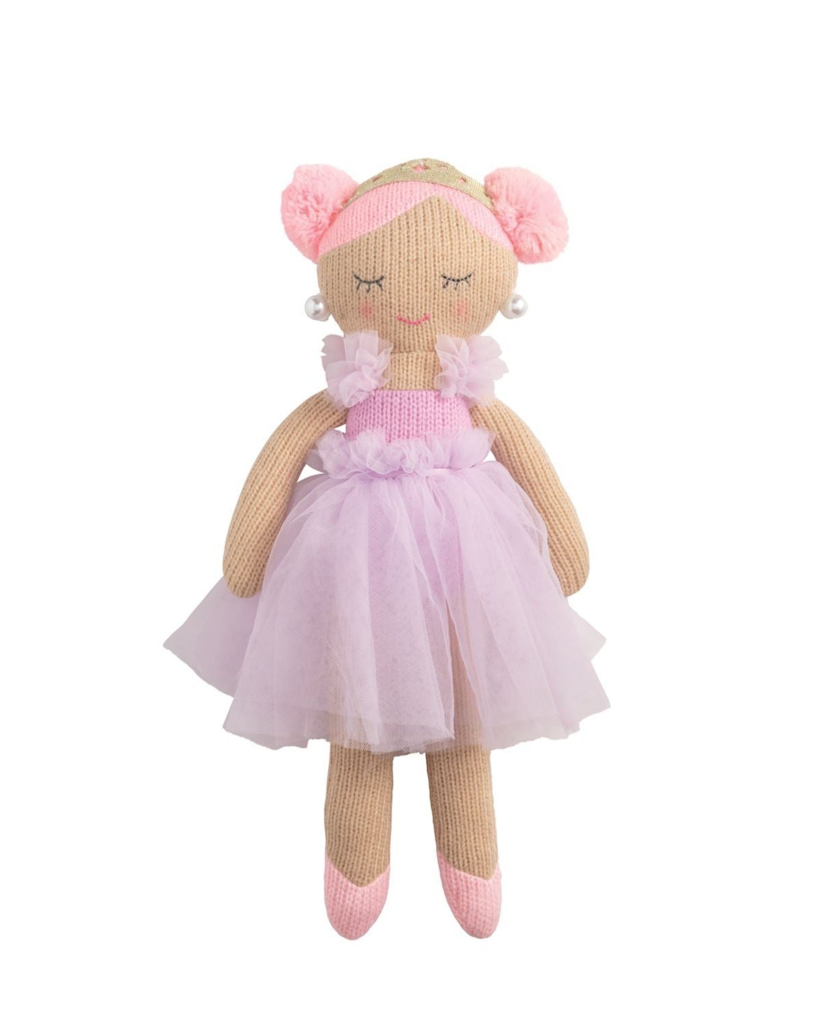 Toy doll with pink dress and hair on a white background