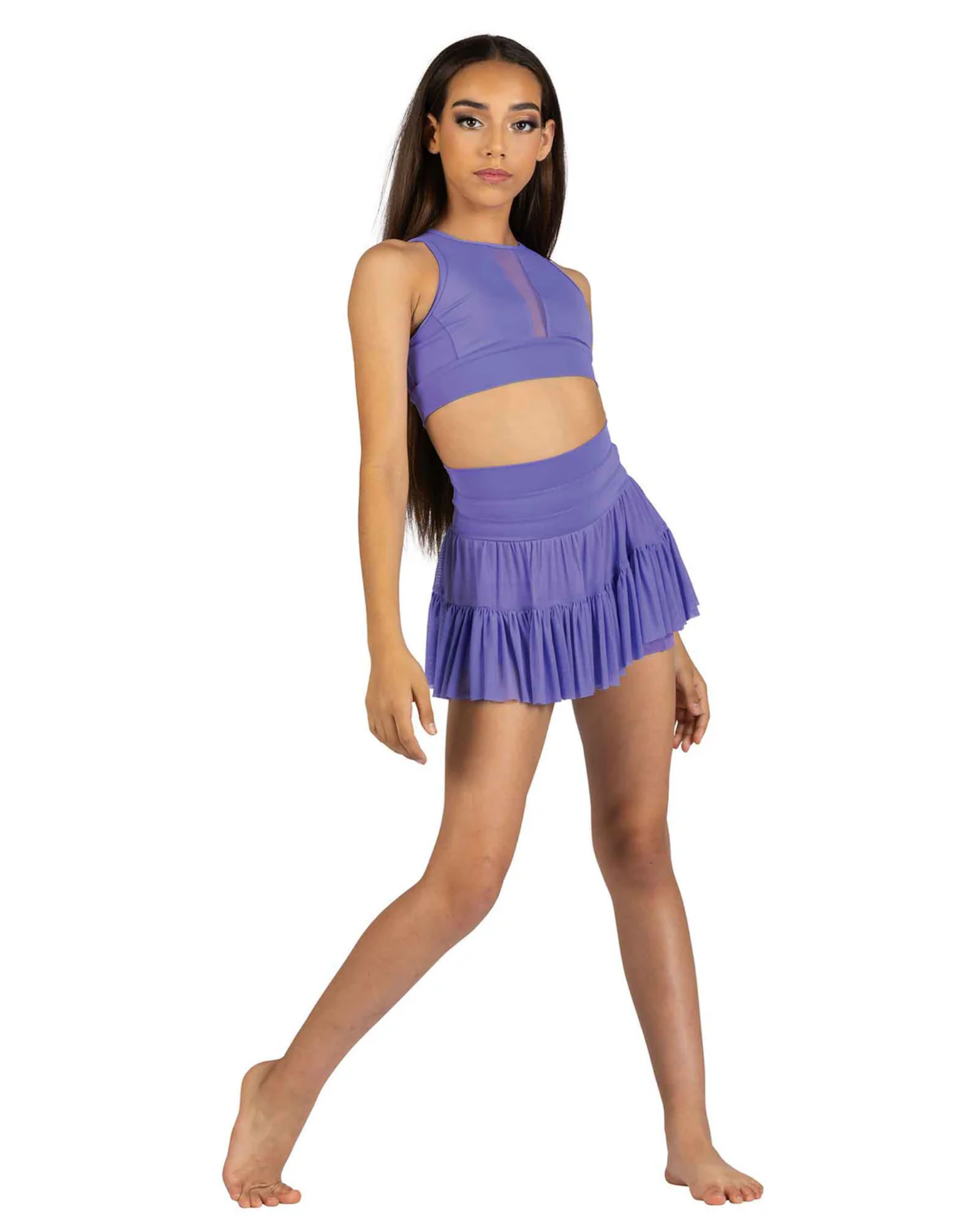 Woman wearing a purple dance outfit on a white background