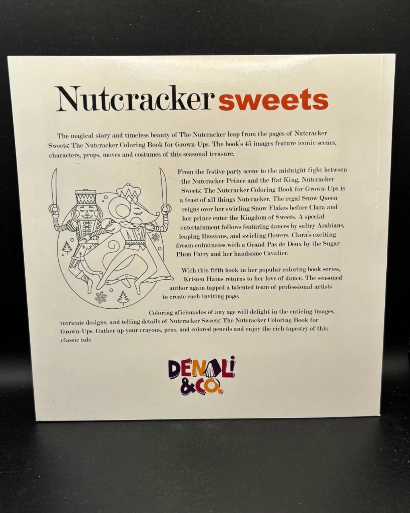 A printed Nutcracker-themed coloring book cover or booklet page shown against a dark background. The page has a white base with black text, red 'sweets' heading, illustrated nutcracker figures, and a visible 'Denali & Co.