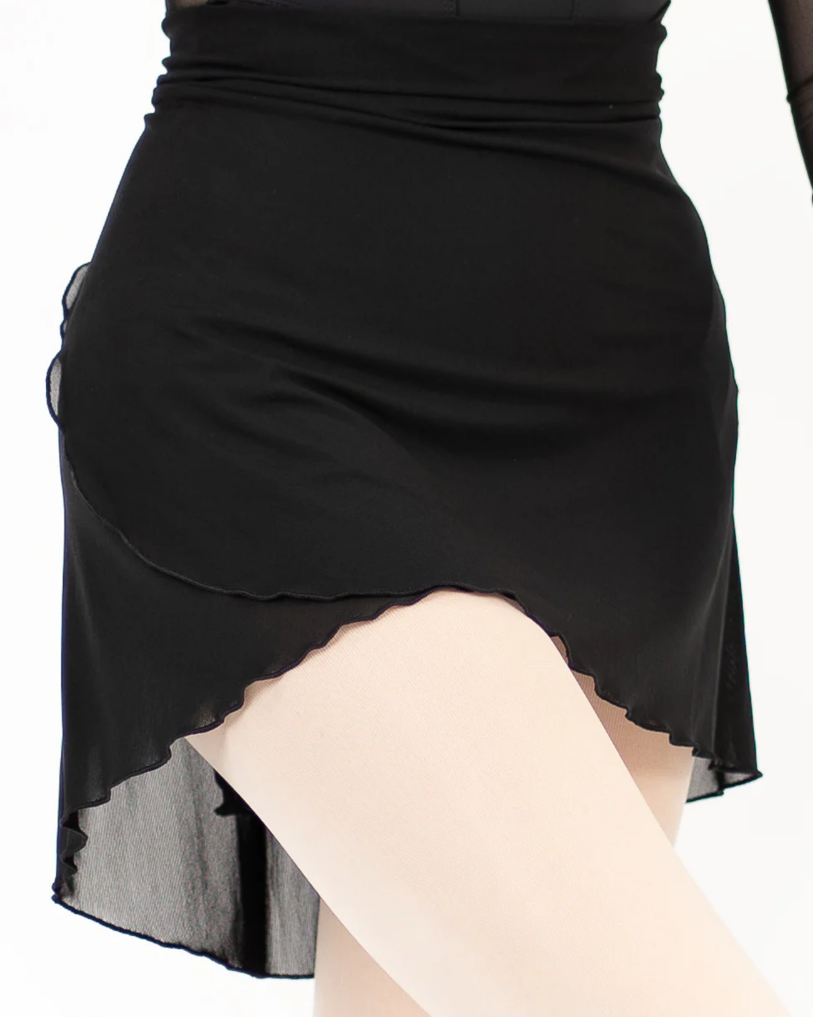 Black skirt with sheer overlay on a white background