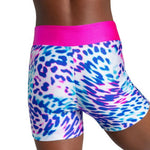 Multicolored animal print shorts with pink waistband on a white background