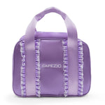 Purple bag with ruffles and 'Capezio' branding on a white background
