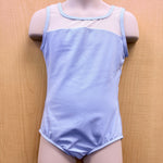 A light blue sleeveless dance leotard with a sheer mesh yoke and light blue trim, displayed on a pink mannequin torso against a light wood background.
