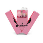 Pink Bunhead brand box with make up tools on a white background
