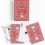 A set of Nutcracker-themed playing cards with a decorative red box and several cards fanned out below, including a King, Ace of Spades, and Ace of Clubs, on a clean white background.