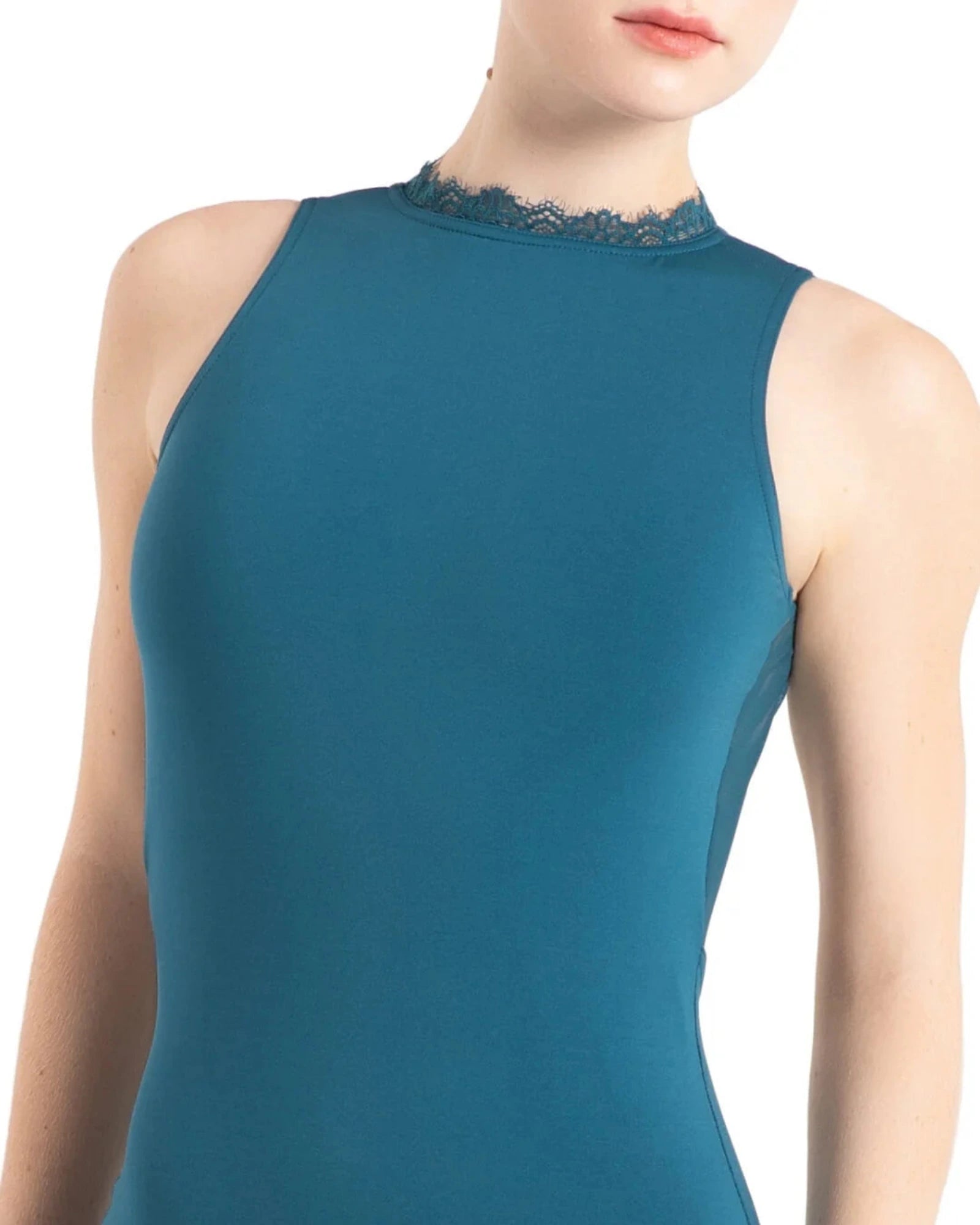 A close-up of a dancer wearing a sleeveless teal blue top with a lace-trimmed mock neck, shown against a plain white background.