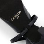 Black ballet shoe with 'Capezio' branding on a white background