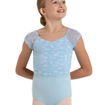 A young girl modeling a light blue leotard with a cloud pattern on the top half and solid light blue bottoms, set against a plain white background.