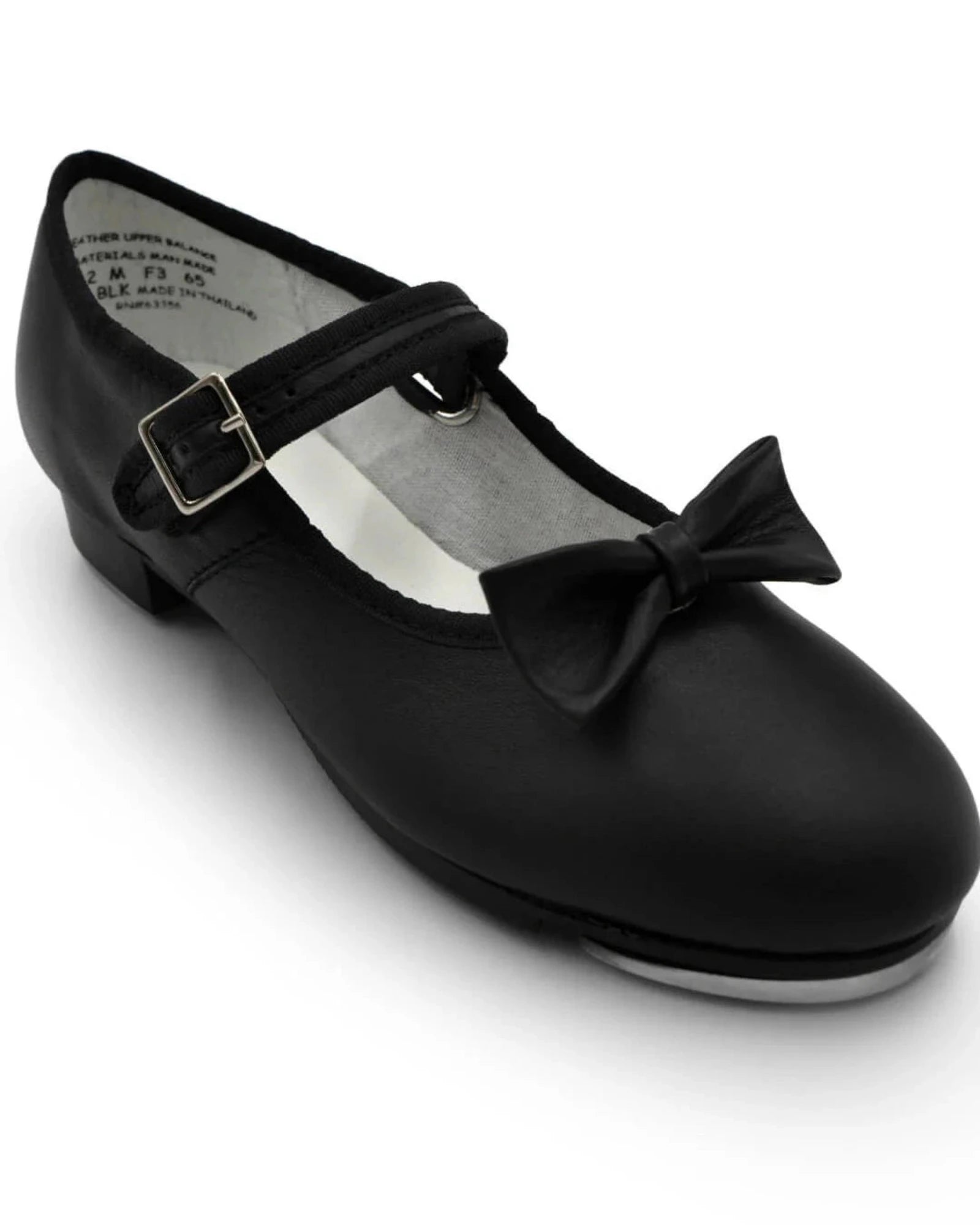 Black tap shoe with a bow on a white background