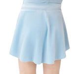 A light blue flared skirt with a matching light blue top, shown on a model against a plain white background.