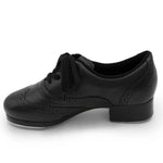 Black tap dance shoe on a white background