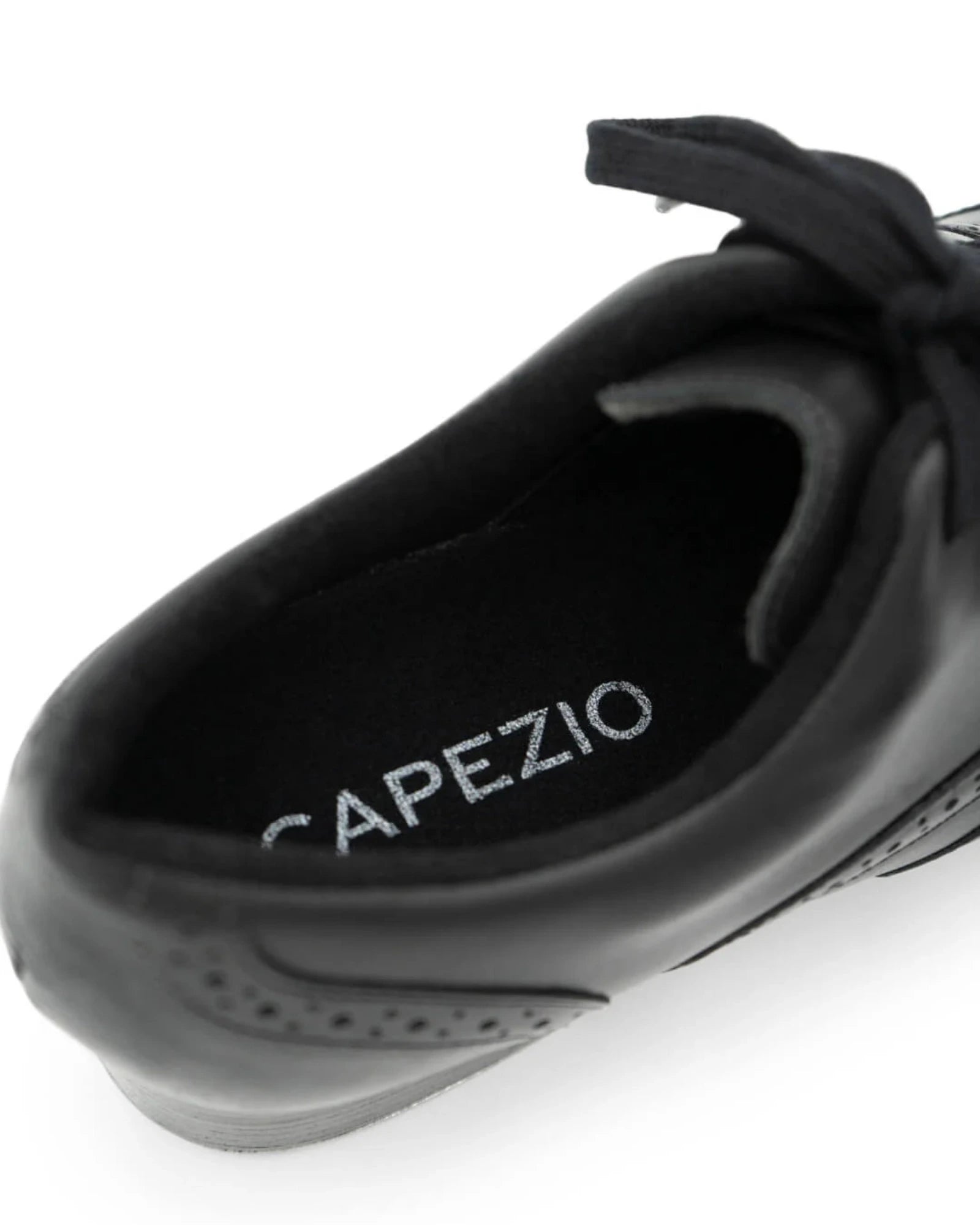 Black dance shoe with 'CAPEZIO' branding on a white background