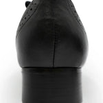 Black leather tap shoe on a white background