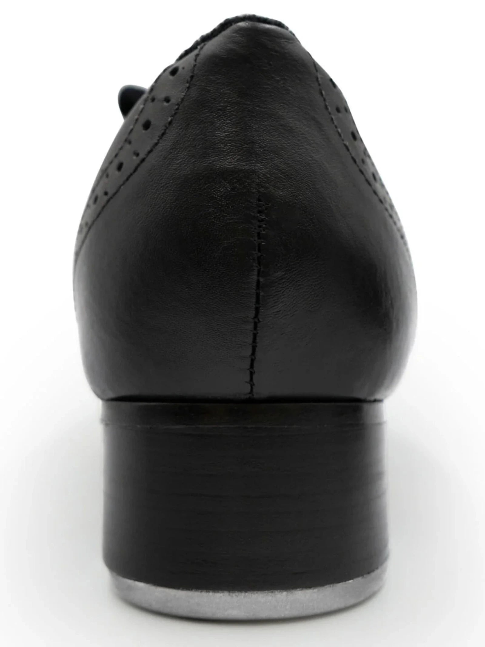 Black leather tap shoe on a white background