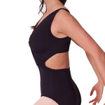 Black leotard with cut-out design worn by a model on a white background