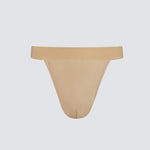 Beige thong on a light gray background